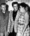 Elvis_with_parents_1958.jpg