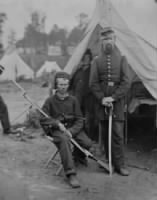 Captain Harrison H. Jeffords with young unidentified private.jpg