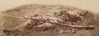 Federal_soldier_disembowelled_by_a_shell-_in_the_wheatfield_Gettysburg_3July1863-_detail_LOC-LC-USZC4-1824.png