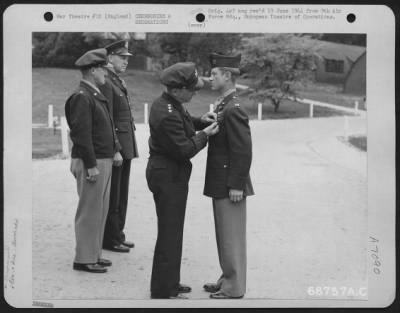 Thumbnail for Awards > Capt. Vernon R. Turner Is Presented The Silver Star By Lt. General Lewis H. Brereton.  Brig. General Vic H. Strahm And Brig. Gen. Otto P. Weyland Stand In The Background.  31 May 1944, England.