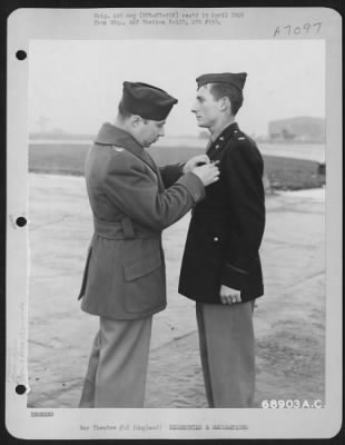 Awards > Lt. Caton Of The 353Rd Fighter Group Is Presented The Air Medal By Colonel Rimmerman Somewhere In England, 30 December 1944.