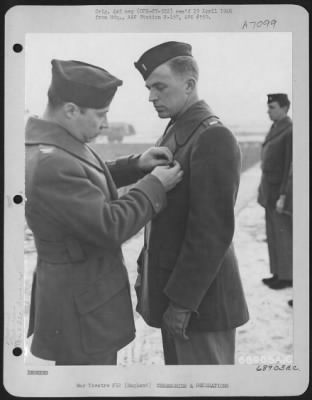Awards > Lt. Chase Of The 353Rd Fighter Group Is Presented The Air Medal By Colonel Rimerman Somewhere In England, 30 December 1944.