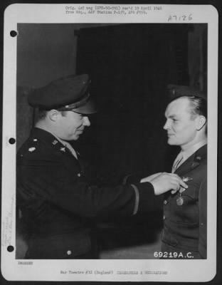 Awards > Lt. Carb Of The 353Rd Fighter Group Is Presented The Air Medal By Lt. Colonel B. Rimerman On 29 August 1944 At An Airbase In England.