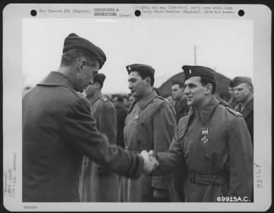 Thumbnail for Awards > Lt. Becker Of The 490Th Bomb Group Is Awarded The Distinguished Flying Cross By Major General Earle E. Partridge At An 8Th Air Force Base In England.  12 February 1945.