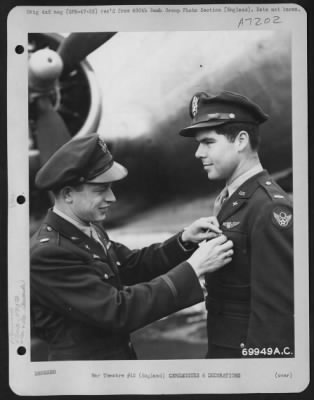 Awards > Lt. Charles J. Garner Of The 490Th Bomb Group Is Awarded The Distinguished Flying Cross During A Ceremony At An 8Th Air Force Base In England On 21 October 1944.