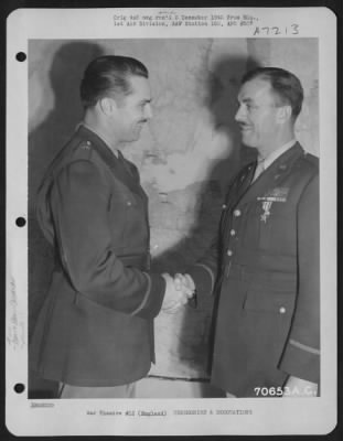Awards > Colonel Turner, Attached To Hdq., 1St Bomb Division, Is Congratulated By Brig. General Alfred R. Maxwell After Receiving The Silver Star During A Ceremony On 28 December 1943 At An 8Th Air Force Base In England.