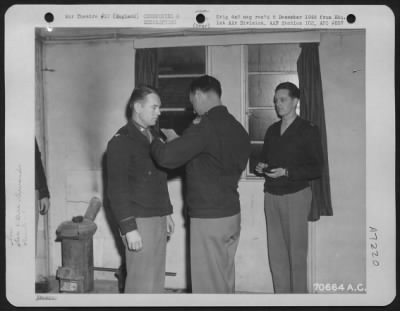 Thumbnail for Awards > Colonel Whetstone, Attached To Hdq., 1St Bomb Division, Receives An Award During A Ceremony At An 8Th Air Force Base In England On 20 Nov. 1944.