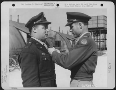 Thumbnail for Awards > Lt. Breadon Of The 364Th Fighter Group Is Presented An Award By Colonel Hentry At Station F-378, England.  25 March 1945.