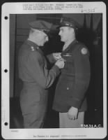 1St L. Mahlen A. Hillebrand, Faribault, Minn., Of The U.S. 8Th Air Force, Is Presented The Distinguished Service Cross By Lt. General Carl A. Spaatz, Commanding General Of The U.S. Strategic Air Forces In Europe.  The Distinguished Service Cross Was Awrde - Page 1