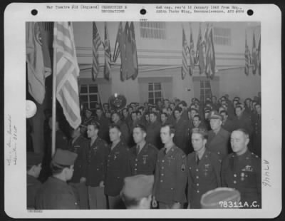 Awards > A Group Of 381St Bomb Group Members Pose For The Photographer After Receiving Awards During A Ceremony At An Air Base Somewhere In England.  18 December 1943.