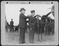 Secretary Of War Henry L. Stimson Presents The Congressional Medal Of Honor To S/Sgt. Maynard H. Smith, A Boeing B-17 Gunner From Caro, Michigan, During A Ceremony At Thurleigh, England On 15 July 1943. - Page 1