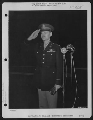 Awards > After Being Presented The Congressional Medal Of Honor During A Ceremony At Norfolk, England On 22 November 1943, Colonel Leon W. Johnson Of Moline, Kansas Stands At Attention And Salutes During The Playing Of The National Anthem.
