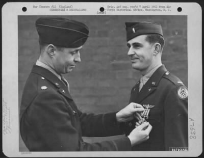 Thumbnail for Awards > 1St Lt. Lanini Of The 755Th Bomb Squadron, 458Th Bomb Group Is Presented The Distinguished Flying Cross During A Ceremony At An Air Base Somewhere In England.  14 December 1944.