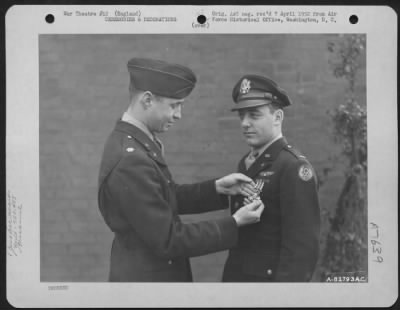 Awards > 2Nd Lt. Huff Of The 755Th Bomb Squadron, 458Th Bomb Group Is Presented The Distinguished Flying Cross During A Ceremony At An Air Base Somewhere In England.  14 December 1944.