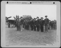 Watching The Troops Pass In Review After The Secretary Of War Presented The Congressional Medal Of Honor To S/Sgt. Maynard H. Smith, A Boeing B-17 Gunner From Caro, Michigan, Are, Front Row, Left To Right: Secretary Of War Henry L. Stimson, Sgt. Smith And - Page 1