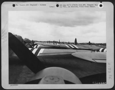 General > In the few minutes before take off time, scores of Douglas C-47 transports and the gliders they will tow, loaded with airborne infantryman, are shown stacked on a 9th Troop Carrier Command field.