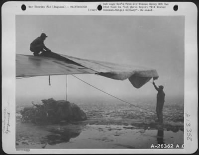 Thumbnail for General > 8th Air force, England-Canvas Covers to protect the wing tips of Boeing B-17 Flying ofrtresses during England's wintery ofgs.