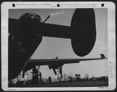 Thumbnail for General > Liberator "Flak Alley" gets a thorough going over by members of her ground crew.