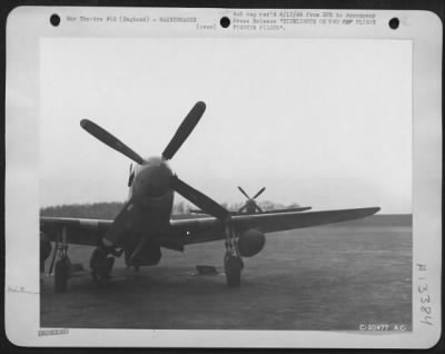 Thumbnail for General > Capt. Don. S. Gentile's P-51 is worked on after returning to its base at dusk.