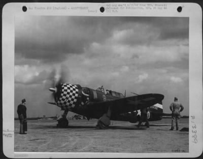 Thumbnail for General > Crew chief, S/Sgt. James Tibbs of Taylor, Pa., stands in readiness with fire extinguisher as safety measure while engineering specialist S/Sgt. Harry Newburg, Lizella, Ga., "runs up" the engine on a test. The Republic P-47 Thunderbolts undergo