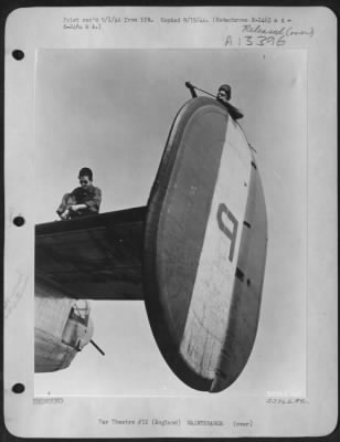 Thumbnail for General > ENGLAND-Cpl Jerome Hutchins of High Point, N.C., and S/Sgt Finnon King, Bonneville, Miss. work on the tail of a B-24.