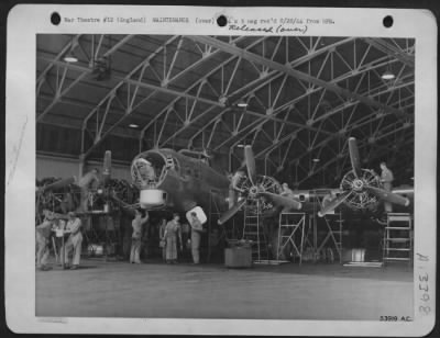 Thumbnail for General > CHECK LIST There are so many things to be checked on each Boeing B-17 Flying ofrtress that comes into the 8th AF base depot in England from the States that many men work on a plane at one time. Here, the crew chief and two assistants stand at a desk