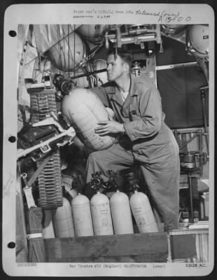 Thumbnail for General > ENGLAND Regulating an oxygen valve inside a Consolidated B-24 Liberator is Sgt Clifofrd Coates, Fairfield, Texas, member of the Liberator Group commanded by Colonel Luther J. Fairbanks of Burt, Iowa.