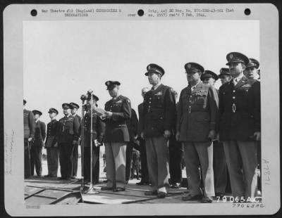 Thumbnail for Miscellaneous > Major General Ira C. Eaker, Cg 8Th Af Accepts The Newly Completed Yankee Built Airdrome For The Usaaf.  This Field, The First Of Many To Come, Was Constructed In Record Time By The U.S. Engineers.  Left To Right Are: Air Chief Marshal Courtenay, Of The Ra