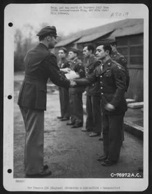 Thumbnail for Unidentified > A Members Of The 568Th Bomb Squadron, 390Th Bomb Group, Receives An Award During A Ceremony At An Air Base In England.  20 January 1944.