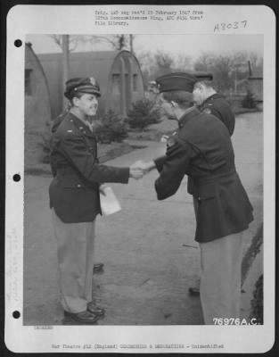 Thumbnail for Unidentified > A Member Of The 569Th Bomb Squadron, 390Th Bomb Group, Is Congratulated After Receiving An Award During A Ceremony At An Air Base In England.  23 February 1944.