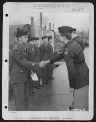 Thumbnail for Unidentified > A Member Of The 569Th Bomb Squadron, 390Th Bomb Group, Is Congratulated After Receiving An Award During A Ceremony At An Air Base In England.  23 February 1944.