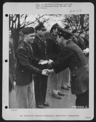 Thumbnail for Unidentified > A Member Of The 570Th Bomb Squadron, 390Th Bomb Group Is Congratulated After Receiving An Award During A Ceremony At An Air Base Somewhere In England.  19 March 1944.