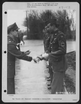 Thumbnail for Unidentified > A Member Of The 570Th Bomb Squadron, 390Th Bomb Group Is Congratulated After Receiving An Award During A Ceremony At An Air Base Somewhere In England.  19 March 1944.