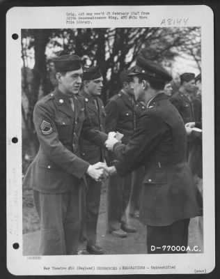 Thumbnail for Unidentified > A Member Of The 570Th Bomb Squadron, 390Th Bomb Group Is Congratulated After Receiving An Award During A Ceremony At An Air Base Somewhere In England.  19 March 1944.