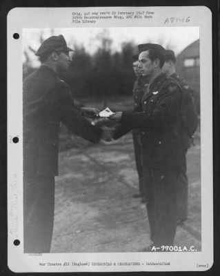 Thumbnail for Unidentified > A Member Of The 571St Bomb Squadron, 390Th Bomb Group Is Congratulated After Receiving An Award During A Ceremony At An Air Base Somewhere In England.  28 January 1944.