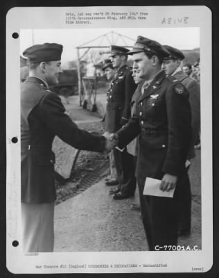 Thumbnail for Unidentified > A Member Of The 571St Bomb Squadron, 390Th Bomb Group Is Congratulated After Receiving An Award During A Ceremony At An Air Base Somewhere In England.  22 February 1944.