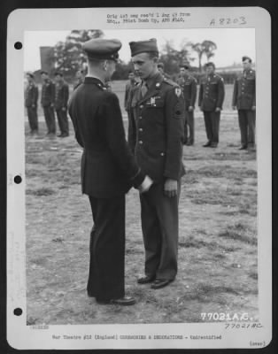 Thumbnail for Unidentified > Brig. Gen. Samuel E. Anderson Congratulates A Member Of The 391St Bomb Group On Receiving The Legion Of Merit During A Ceremony At An Air Base In England.  27 July 1944.