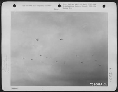 General > A Pattern Of Transport Planes And Gliders Is Pictured Against A Grey English Sky As The 439Th Troop Carrier Group Sends Load After Load Of Airborne Infantrymen To France Where Allied Forces Are Fighting For The Liberation Of Europe.  7 June 1944.