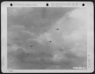 General > A Pattern Of Transport Planes And Gliders Is Pictured Against A Grey English Sky As The 439Th Troop Carrier Group Sends Load After Load Of Airborne Infantrymen To France Where Allied Forces Are Fighting For The Liberation Of Europe.  7 June 1944.