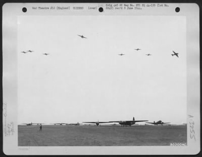 General > Douglas C-47S, Attached To The 101St Airborne Division, Fly Over British Horsa Gliders Which They Have Dropped During Maneuvers In Berks, England.  6 January 1944.
