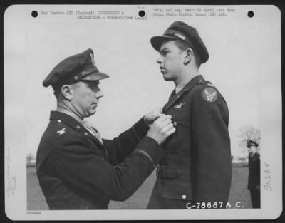 Thumbnail for Unidentified > An Officer Presents An Award To A Member Of The 314Th Service Group Of The 364Th Fighter Group During A Ceremony At An Airbase Somewhere In England.  28 April 1944.