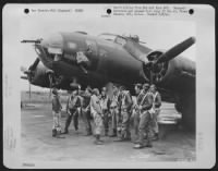 ENGLAND-Crew of the Boeing B-17 "Nora" of 305th Bomb Group, in front of their plane after a raid. On this picture are: 1st Lt. Lester Personeus, Jr., 67 Wayne Ave., Suffern, N.Y., Pilot; F/O Charles J. Harpool, Rt. 4, Rogers, Ark., co-pilot; 2nd Lt. - Page 1