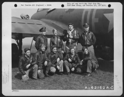 General > Lt. Charles E. Cliburn And Crew Of The 324Th Bomb Squadron, 91St Bomb Group, 8Th Air Force, Pose With Their Mascot 'Skippy' Beside A Boeing B-17 Flying Fortress.  England, 24 March 1943.