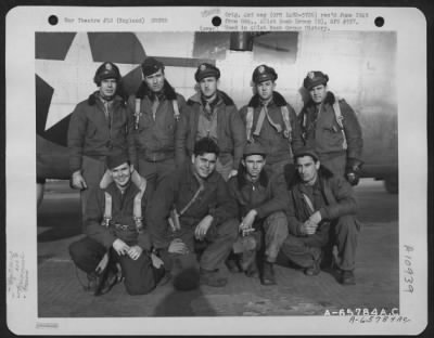 General > Lt. White, Lt. Spuhler And Crew (Crew 18) Of The 615Th Bomb Squadron, 401St Bomb Group, Beside A Boeing B-17 "Flying Fortress" At An 8Th Air Force Base In England.  1 April 1945.