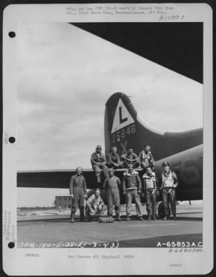 General > Crew Of The 381St Bomb Group Pose By The Tail Of A Boeing B-17 "Flying Fortress" (Aircraft No. 25846) At 8Th Air Force Station 167, Ridgewell, Essex County, England.  1 September 1943.