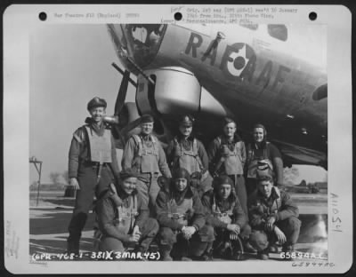 General > Lt. Carpenter And Crew Of The 381St Bomb Group Standing By Plane Which They Flew With The Raf On A Mission To Germany.  England, 3 March 1945.