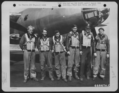 General > Capt. Boon And Crew Of The 573Rd Bomb Squadron, Pose Beside The Martin B-26 Marauder Of The 391St Bomb Group, England, 21 August 1944.