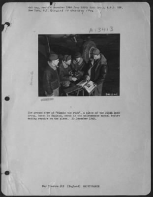 Thumbnail for General > Ground Crew Of "Winnie The Pooh" A Plane Of The 385Th Bomb Group, Based In England, Check In The Maintenance Manual Before Making Repairs On The Plane.  20 December 1943.