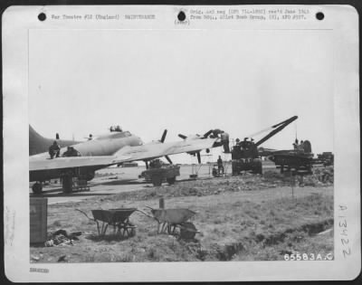 Thumbnail for General > Their Wings Don'T Stay Clipped Long!  With The Aid Of A Truck Borne Crane, Workers Remove The Outboard Wing Section Of A Boeing B-17 "Flying Fortress" And Begin Work On The Sheared Cables Inside.  England, 401St Bomb Group, 2 June 1944.