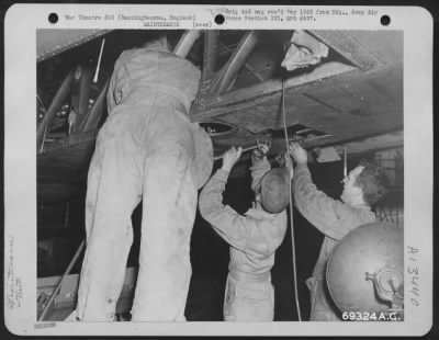 General > Sheet Metal Workers Patch The Underside Of A Boeing B-17 "Flying Fortress" Wing At The 91St Bomb Group Base In Bassingbourne, England On 7 August 1943.
